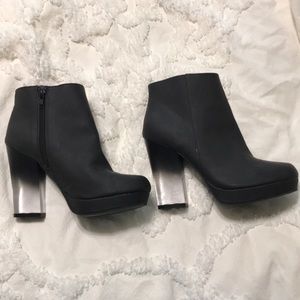 Black ankle boots with transparent ombré heel